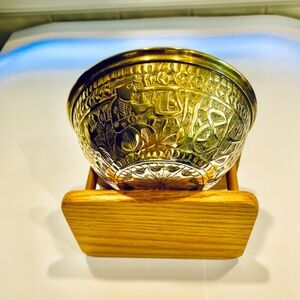 Five middle-eastern brass bowls, 2 x 4 7/8 inches.